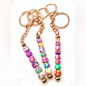Colorful Beaded Keychains with Gold Accents
